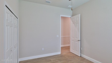 Welcome to this beautiful 3-bedroom, 2-bath villa home, built in on Halifax Plantation Golf Club in Florida - for sale on GolfHomes.com, golf home, golf lot