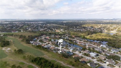 Stunning 3 car garage home on golf course! Well maintained 4 on Summerfield Crossing Golf Club in Florida - for sale on GolfHomes.com, golf home, golf lot