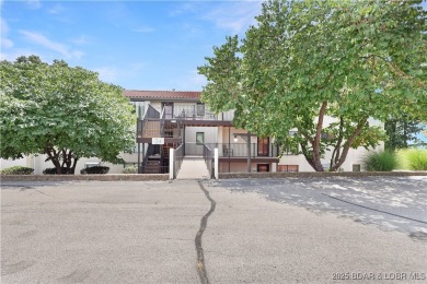 Updated Walk-In Level Unit - NO STEPS! Spacious 2 bedroom, 2 on Seasons Ridge At Four Seasons in Missouri - for sale on GolfHomes.com, golf home, golf lot