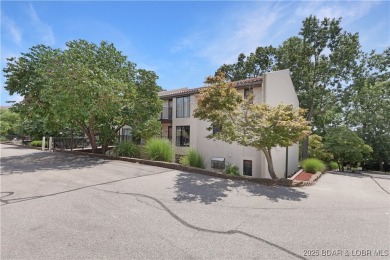 Updated Walk-In Level Unit - NO STEPS! Spacious 2 bedroom, 2 on Seasons Ridge At Four Seasons in Missouri - for sale on GolfHomes.com, golf home, golf lot
