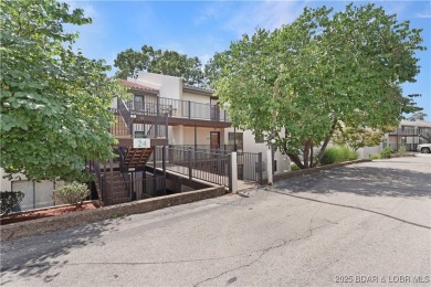 Updated Walk-In Level Unit - NO STEPS! Spacious 2 bedroom, 2 on Seasons Ridge At Four Seasons in Missouri - for sale on GolfHomes.com, golf home, golf lot