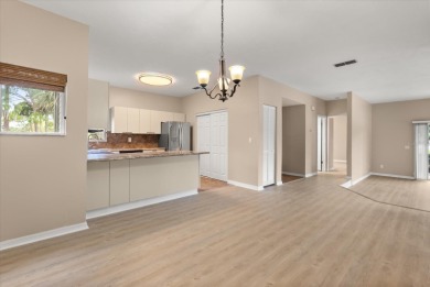 Beautiful corner condominium with serene pond views located in on Plantation Bay Golf and Country Club in Florida - for sale on GolfHomes.com, golf home, golf lot
