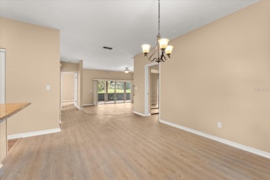 Beautiful corner condominium with serene pond views located in on Plantation Bay Golf and Country Club in Florida - for sale on GolfHomes.com, golf home, golf lot