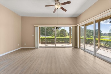 Beautiful corner condominium with serene pond views located in on Plantation Bay Golf and Country Club in Florida - for sale on GolfHomes.com, golf home, golf lot