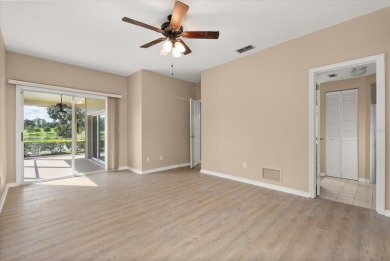 Beautiful corner condominium with serene pond views located in on Plantation Bay Golf and Country Club in Florida - for sale on GolfHomes.com, golf home, golf lot
