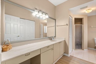 Beautiful corner condominium with serene pond views located in on Plantation Bay Golf and Country Club in Florida - for sale on GolfHomes.com, golf home, golf lot