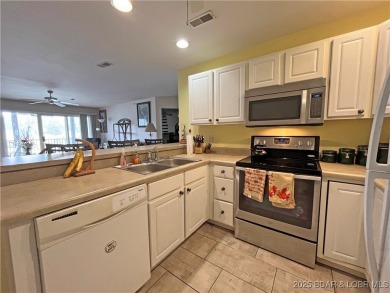 Come check out this spacious 3 bed, 2 bath lakefront condo at on Lake Valley Country Club in Missouri - for sale on GolfHomes.com, golf home, golf lot