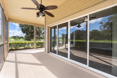 Beautiful corner condominium with serene pond views located in on Plantation Bay Golf and Country Club in Florida - for sale on GolfHomes.com, golf home, golf lot