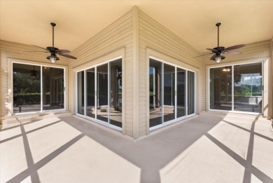 Beautiful corner condominium with serene pond views located in on Plantation Bay Golf and Country Club in Florida - for sale on GolfHomes.com, golf home, golf lot
