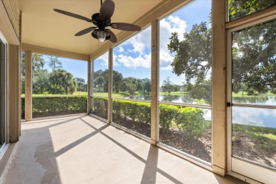 Beautiful corner condominium with serene pond views located in on Plantation Bay Golf and Country Club in Florida - for sale on GolfHomes.com, golf home, golf lot