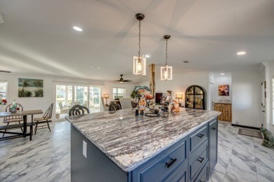 If you're looking for a gorgeous home in a gated golf community on Pine Lakes Country Club in Florida - for sale on GolfHomes.com, golf home, golf lot