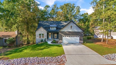 This stunning single-level home is full of modern touches and on Toqua Golf Course - Loudon County in Tennessee - for sale on GolfHomes.com, golf home, golf lot