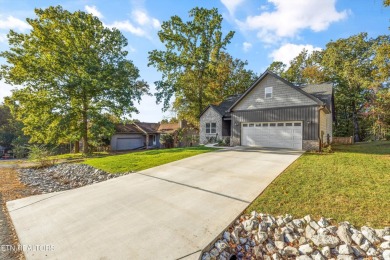 This stunning single-level home is full of modern touches and on Toqua Golf Course - Loudon County in Tennessee - for sale on GolfHomes.com, golf home, golf lot