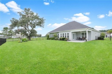 This stunning home is a light-filled haven with 3 bedrooms and 2 on Hilton Head Lakes Golf Club in South Carolina - for sale on GolfHomes.com, golf home, golf lot