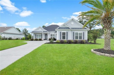 This stunning home is a light-filled haven with 3 bedrooms and 2 on Hilton Head Lakes Golf Club in South Carolina - for sale on GolfHomes.com, golf home, golf lot