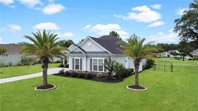 This stunning home is a light-filled haven with 3 bedrooms and 2 on Hilton Head Lakes Golf Club in South Carolina - for sale on GolfHomes.com, golf home, golf lot