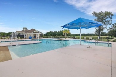 This stunning home is a light-filled haven with 3 bedrooms and 2 on Hilton Head Lakes Golf Club in South Carolina - for sale on GolfHomes.com, golf home, golf lot