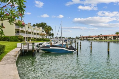 Welcome to your dream waterfront townhome in the exclusive on Treasure Bay Golf and Tennis in Florida - for sale on GolfHomes.com, golf home, golf lot