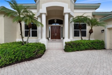 This fabulous Creekside home has it all!  An impressive circular on Bonita Bay West in Florida - for sale on GolfHomes.com, golf home, golf lot