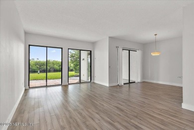 This first-floor, 2-bedroom, 2-bath condo with a large screen on Sawgrass Country Club  in Florida - for sale on GolfHomes.com, golf home, golf lot