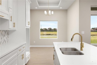 This beautiful 4-bedroom, 2.5-bath home offers a stunning lake on Los Lagos Golf Club in Texas - for sale on GolfHomes.com, golf home, golf lot