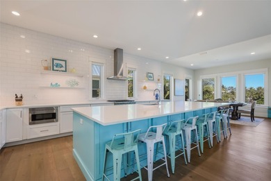 An exceptional opportunity to experience true island living on Key Royale Club in Florida - for sale on GolfHomes.com, golf home, golf lot