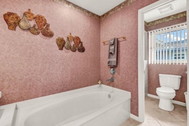 Beautiful views of 2 lakes from all the living areas in this 3 on Martin Downs Country Club in Florida - for sale on GolfHomes.com, golf home, golf lot