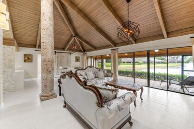 Experience the epitome of refined living in this exceptional on Palm Beach Polo and Country Club in Florida - for sale on GolfHomes.com, golf home, golf lot