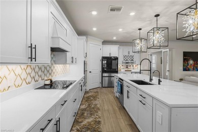 Discover unparalleled luxury in this rare, meticulously on River Hall Country Club in Florida - for sale on GolfHomes.com, golf home, golf lot