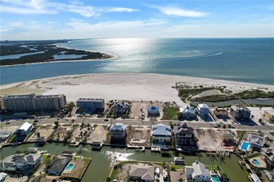 Located in the quaint boating community of Laguna Shores on Fort Myers Beach and Golf Club in Florida - for sale on GolfHomes.com, golf home, golf lot