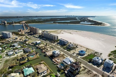 Located in the quaint boating community of Laguna Shores on Fort Myers Beach and Golf Club in Florida - for sale on GolfHomes.com, golf home, golf lot