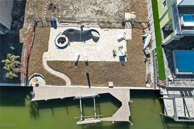 Located in the quaint boating community of Laguna Shores on Fort Myers Beach and Golf Club in Florida - for sale on GolfHomes.com, golf home, golf lot