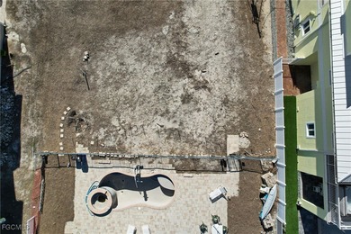 Located in the quaint boating community of Laguna Shores on Fort Myers Beach and Golf Club in Florida - for sale on GolfHomes.com, golf home, golf lot