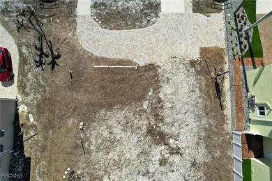 Located in the quaint boating community of Laguna Shores on Fort Myers Beach and Golf Club in Florida - for sale on GolfHomes.com, golf home, golf lot