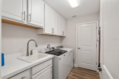 This stunning Flamingo Model home, built in 2021 is situated in on Miona Lake Golf Club in Florida - for sale on GolfHomes.com, golf home, golf lot