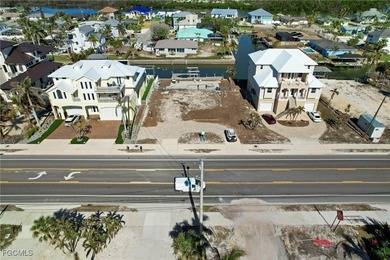 Located in the quaint boating community of Laguna Shores on Fort Myers Beach and Golf Club in Florida - for sale on GolfHomes.com, golf home, golf lot