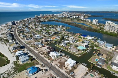 Located in the quaint boating community of Laguna Shores on Fort Myers Beach and Golf Club in Florida - for sale on GolfHomes.com, golf home, golf lot