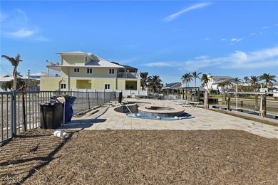 Located in the quaint boating community of Laguna Shores on Fort Myers Beach and Golf Club in Florida - for sale on GolfHomes.com, golf home, golf lot