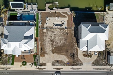 Located in the quaint boating community of Laguna Shores on Fort Myers Beach and Golf Club in Florida - for sale on GolfHomes.com, golf home, golf lot