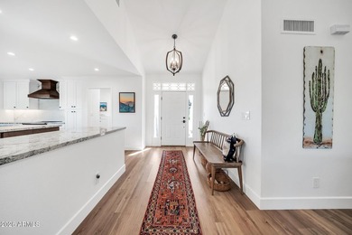 A major remodel was done in 2024, removing a step down upon on Rio Verde Country Club - Quail Run in Arizona - for sale on GolfHomes.com, golf home, golf lot