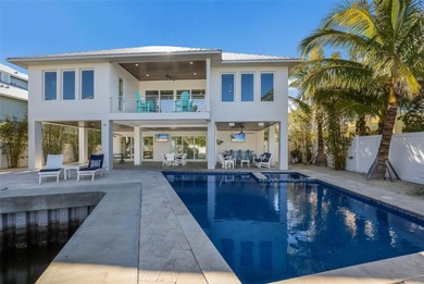 An exceptional opportunity to experience true island living on Key Royale Club in Florida - for sale on GolfHomes.com, golf home, golf lot