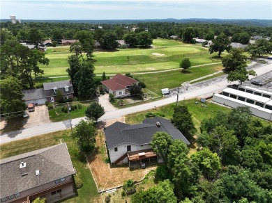 This beautiful home is located on the crest of the Ozark on Holiday Island Golf Course in Arkansas - for sale on GolfHomes.com, golf home, golf lot