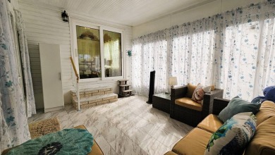 Nestled within the highly sought-after golf course community of on Blue Heron Pines Golf Course in Florida - for sale on GolfHomes.com, golf home, golf lot