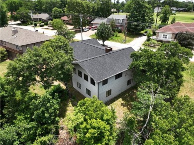 This beautiful home is located on the crest of the Ozark on Holiday Island Golf Course in Arkansas - for sale on GolfHomes.com, golf home, golf lot