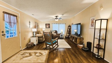 Nestled within the highly sought-after golf course community of on Blue Heron Pines Golf Course in Florida - for sale on GolfHomes.com, golf home, golf lot