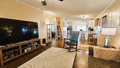 Nestled within the highly sought-after golf course community of on Blue Heron Pines Golf Course in Florida - for sale on GolfHomes.com, golf home, golf lot