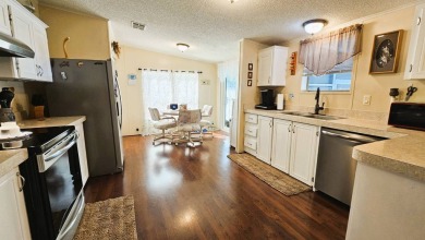 Nestled within the highly sought-after golf course community of on Blue Heron Pines Golf Course in Florida - for sale on GolfHomes.com, golf home, golf lot