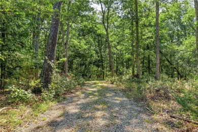 Discover the perfect blend of nature and tranquility on this on Innsbrook Resort Golf Course in Missouri - for sale on GolfHomes.com, golf home, golf lot