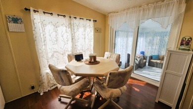 Nestled within the highly sought-after golf course community of on Blue Heron Pines Golf Course in Florida - for sale on GolfHomes.com, golf home, golf lot