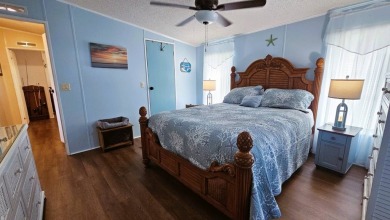 Nestled within the highly sought-after golf course community of on Blue Heron Pines Golf Course in Florida - for sale on GolfHomes.com, golf home, golf lot